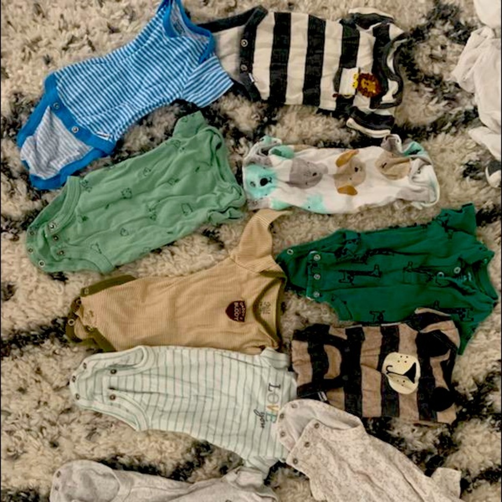 Bundle of Carter’s newborn clothes in excellent condition. NWOT